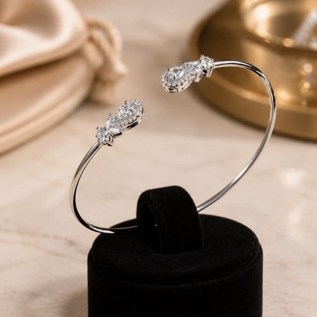 Precious Light Natural 5.2 carat White Topaz .925 Sterling Silver bracelet - Side view of a White Topaz sterling silver bracelet on a display stand.