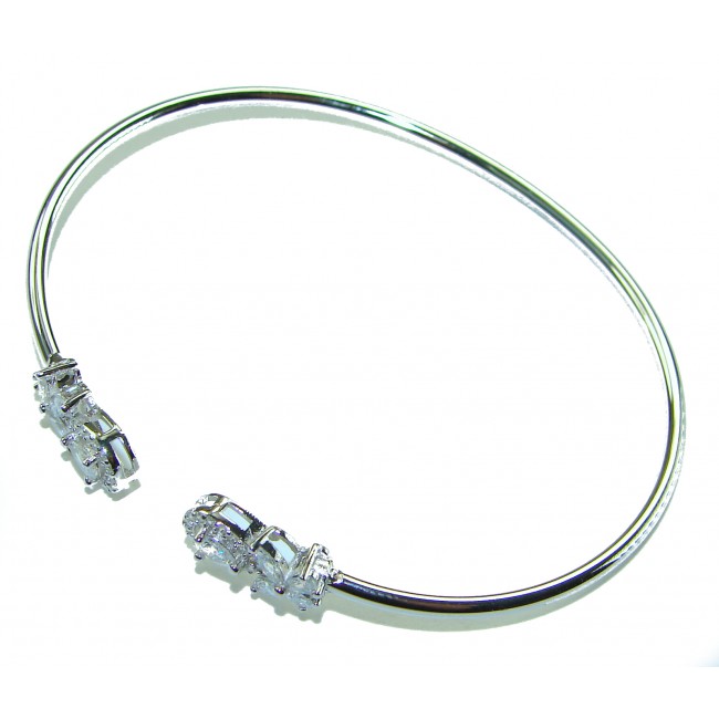 Precious Light Natural 5.2 carat White Topaz .925 Sterling Silver bracelet - Sterling silver bangle with white topaz, angled top view.