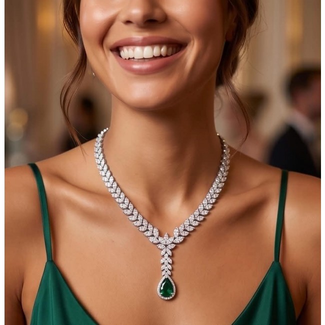 Gabriella 22.7 carat authentic Emerald rhodium over .925 Sterling Silver handcrafted Statement necklace - Emerald necklace worn on neck, showing full design and detail.