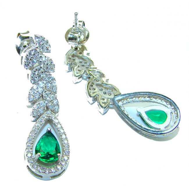 Gabriella 6.7 carat authentic Emerald rhodium over .925 Sterling Silver handcrafted Statement earrings - Emerald earrings, top view, showcasing stones and intricate design.