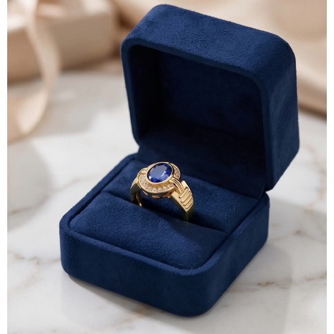 Born to Glam 4.1 carat natural Tanzanite .925 Sterling Silver dipped in 18K Gold Perfectly handcrafted Ring s. 7 - Ring in box with blue stone close-up, gold and silver details.