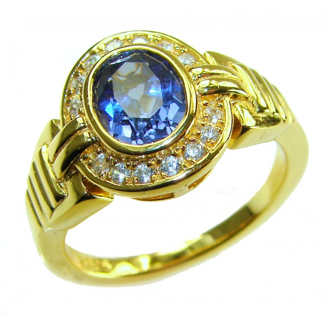 Born to Glam 4.1 carat natural Tanzanite .925 Sterling Silver dipped in 18K Gold Perfectly handcrafted Ring s. 7 - Gold ring with tanzanite and diamonds, side view.