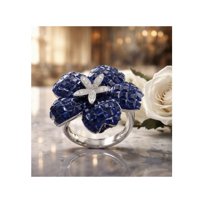Blue Flower 12.2 carat natural Sapphire .925 Sterling Silver Perfectly handcrafted Ring s. 7 1/4 - Blue sapphire flower ring on table with white rose in background