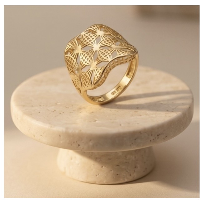 Dubai Style .925 Sterling Silver dipped in 22K Gold handmade Large ring size 9 - Gold-plated ring with intricate design, side view on marble stand.