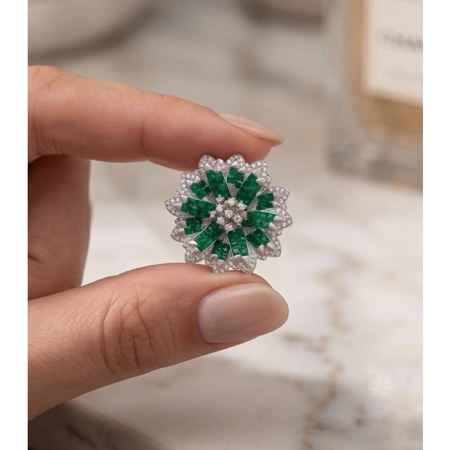 Born to Glam authentic 22.9 carat Colombian Emerald .925 Sterling Silver handcrafted earrings - Close-up of hand holding a 22.9 carat Colombian Emerald jewelry piece