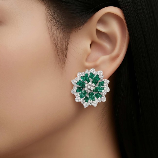 Born to Glam authentic 22.9 carat Colombian Emerald .925 Sterling Silver handcrafted earrings - Emerald flower earrings worn on ear, showcasing detail and sparkle.