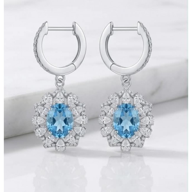 Serenity 4.5 carat genuine Swiss Blue Topaz .925 Sterling Silver handmade earrings - Front view of Serenity Swiss Blue Topaz earrings on white background.