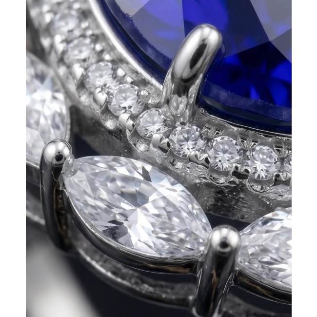 Precious Design oval cut 24.9 CARAT Tanzanite .925 Sterling Silver Statement Ring s. 5 1/4 - Stone close-up of oval cut tanzanite with diamond accents in silver setting.
