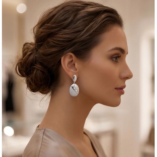 Stella Natural 2.2 carat White Topaz .925 Sterling Silver handcrafted earrings - Side view of woman wearing Stella white topaz sterling silver earring.