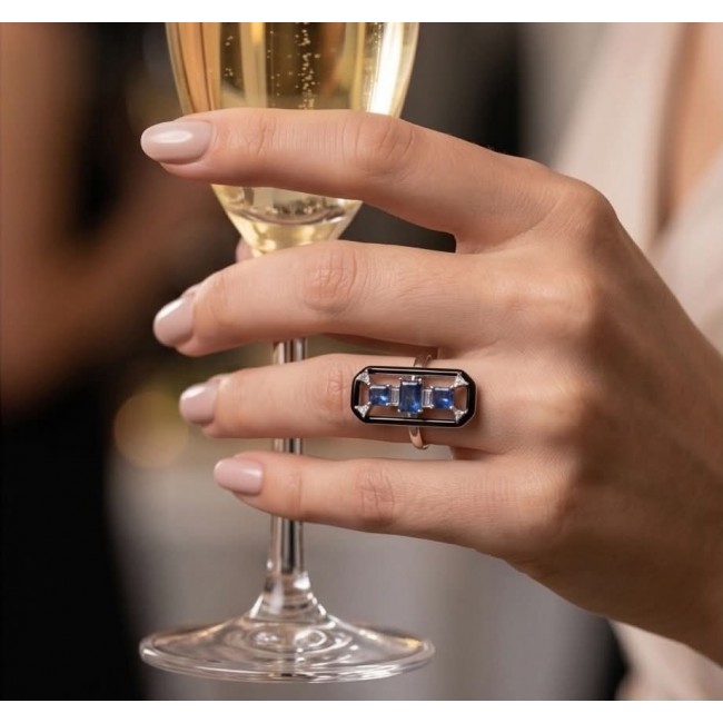 Art Deco 6.2 carat Sapphire black enamel .925 Sterling Silver handcrafted Ring size 6 - Sapphire and enamel ring worn on hand holding a champagne glass.