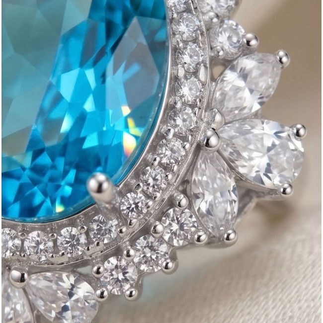 WONDERLAND 15.5 carat Paraiba Tourmaline .925 Sterling Silver Handcrafted Ring size 7 1/2 - Close-up of 15.5 carat Paraiba Tourmaline with diamond accents.