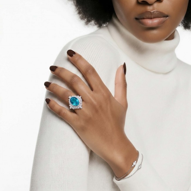 WONDERLAND 15.5 carat Paraiba Tourmaline .925 Sterling Silver Handcrafted Ring size 7 1/2 - Paraiba Tourmaline ring worn on hand, side view, sterling silver.