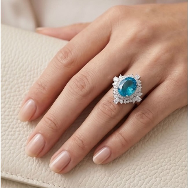 WONDERLAND 15.5 carat Paraiba Tourmaline .925 Sterling Silver Handcrafted Ring size 7 1/2 - Paraiba Tourmaline ring worn on hand, showcasing stone and design details.