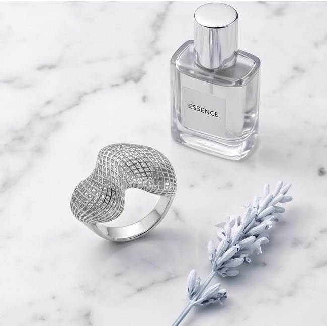 Eternity Bali made .925 Sterling Silver ring size 7 - Silver ring with grid pattern, bottle, and lavender on marble background