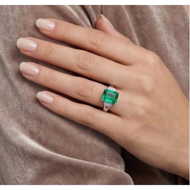 Precious 11.5 carat emerald cut EMERALD .925 Sterling Silver handcrafted ring; s. 8 - Emerald ring on hand, showcasing 11.5 carat stone in sterling silver.