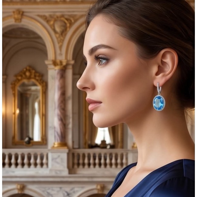 Eau Pure 18.5 carat Swiss Blue Topaz .925 Sterling Silver Handcrafted Earrings - Side view of woman wearing Eau Pure Swiss Blue Topaz earring