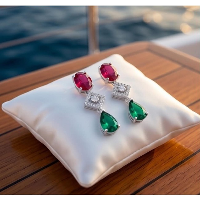 Ginevra - Luxurious natural 10.4 carat Ruby Emerald .925 Sterling Silver handmade Statement Earrings - Elegant Ginevra Ruby Emerald earrings on cushion, top view.