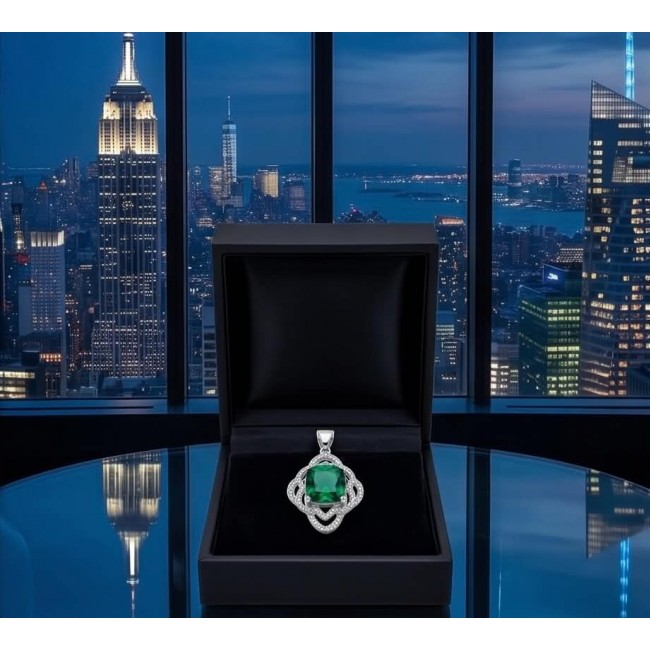 Authentic 4.5 CARAT Chrome Diopside .925 Sterling Silver Pendant - Emerald pendant in open box with city skyline background at night