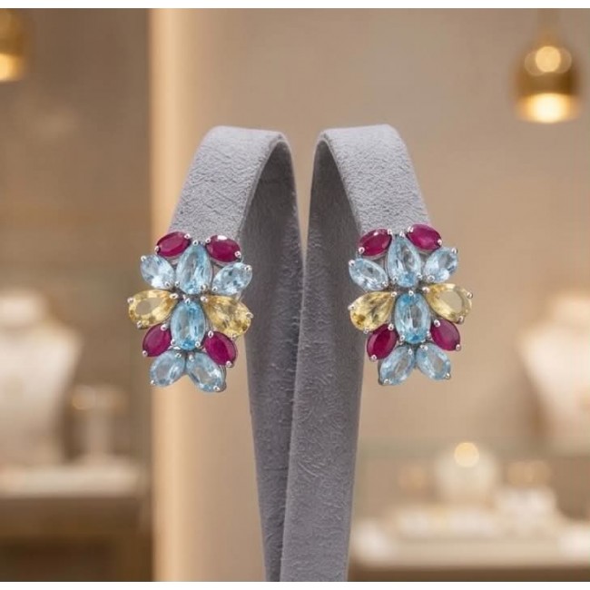 Dolce Vita 29.7 carat Swiss Blue Topaz rhodium over .925 Sterling Silver Handcrafted Statement earrings - Colorful gemstone earrings displayed on a stand, front view