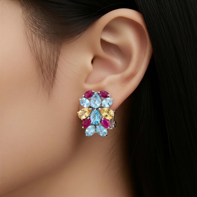 Dolce Vita 29.7 carat Swiss Blue Topaz rhodium over .925 Sterling Silver Handcrafted Statement earrings - Earrings with blue, yellow, and red stones worn on ear.