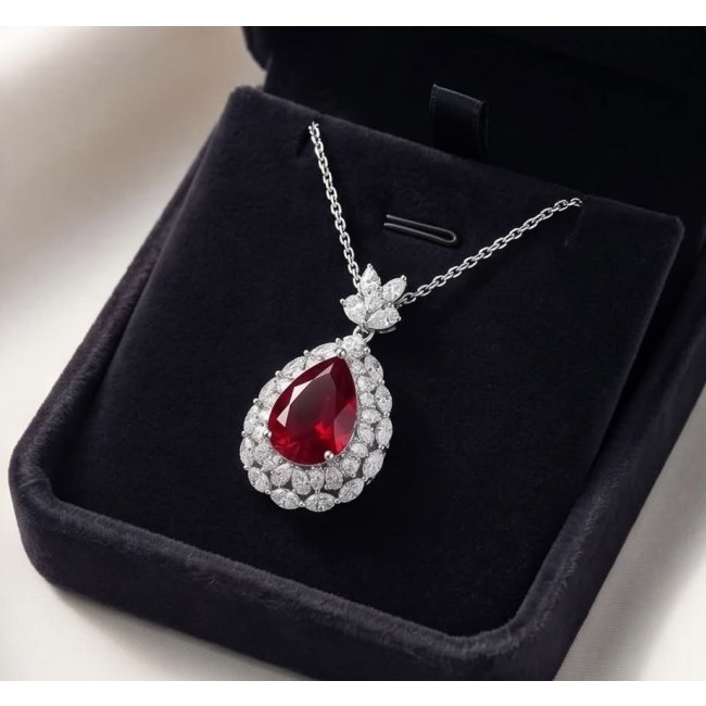 Luxurious 10.8 carat natural Ruby White Topaz .925 Sterling Silver .925 Sterling Silver Statement Necklace - Luxurious ruby necklace in box, showcasing teardrop gem and white topaz settings.