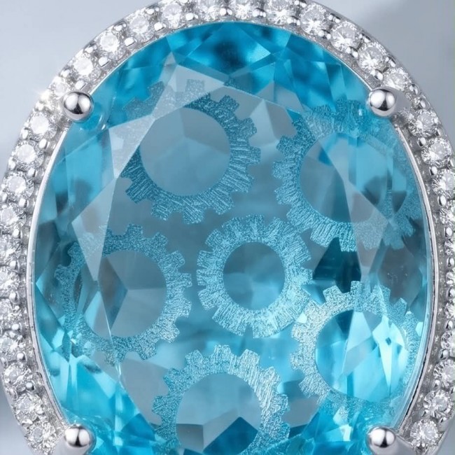 Angelina 20.9 carat authentic Aquamarine .925 Sterling Silver Handcrafted Earrings - Stone close-up of aquamarine in sterling silver setting with gear engraving.