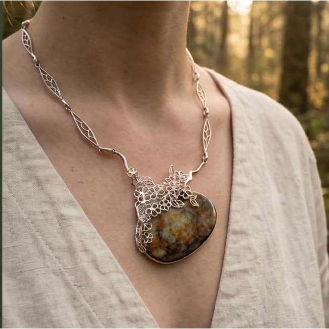 Huge Authenic Australian Boulder Opal .925 Sterling Silver dipped in rhodium brilliantly handcrafted necklace - Opal necklace in sterling silver, worn in a natural outdoor setting.