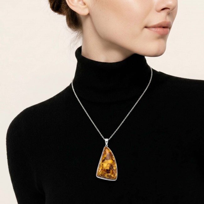 Prehistoric Authentic Baltic Amber .925 Sterling Silver beautifully handcrafted Pendant - Amber pendant necklace on model wearing black turtleneck.