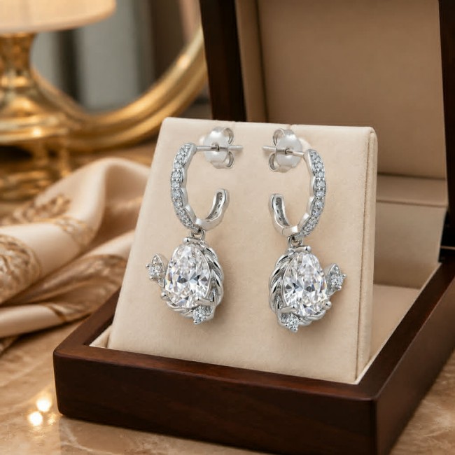 Allure Natural 6.2 carat White Topaz .925 Sterling Silver handcrafted earrings - Close-up of Allure 6.2 carat white topaz earrings in display box.