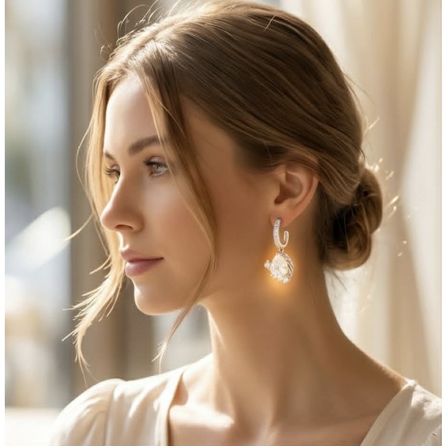 Allure Natural 6.2 carat White Topaz .925 Sterling Silver handcrafted earrings - Woman wearing Allure White Topaz earrings, side profile view.