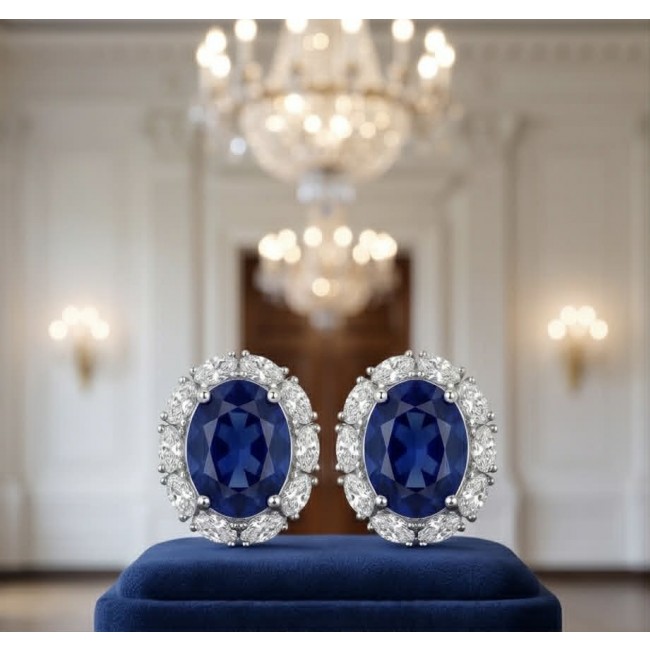 Giovanna - Authentic oval cut 6.8 carat Tanzanite .925 Sterling Silver handcrafted earrings - Close-up of oval cut Tanzanite earrings with diamond accents on a stand.