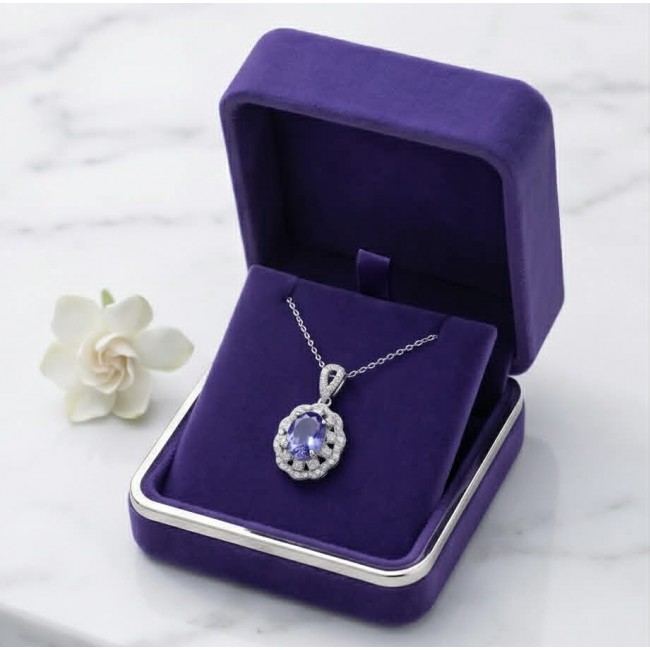 Giovanna - Authentic oval cut 6.8 carat Tanzanite .925 Sterling Silver handcrafted Necklace - Oval Tanzanite pendant in purple box, top view