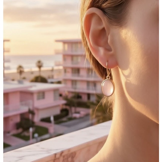 Authentic 10.2 carat Rose Quartz 18K Gold over .925 Silver handcrafted Statement earrings - Earring worn close-up, Rose Quartz in 18K gold over silver.