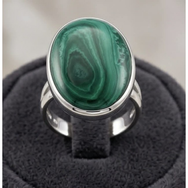 Green Passion 26.2 CARAT genuine Malachite from Utah .925 Sterling Silver handcrafted ring size 8 adjustable - Malachite ring stone close-up on display stand.