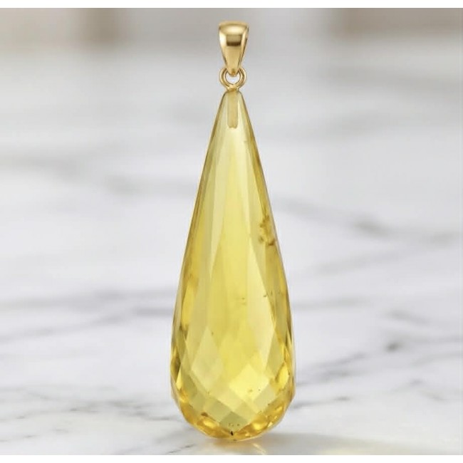 Prehistoric Authentic faceted Golden Baltic Amber REAL 14k Gold beautifully handcrafted Pendant - Close-up of faceted golden Baltic amber pendant with gold bail.