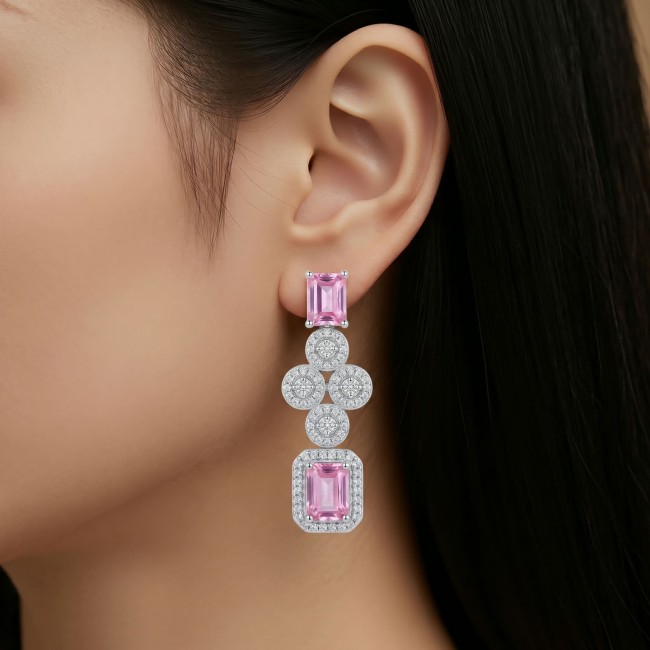 Isabella - Rare Light Pastel 9.9 carat Kunzite .925 Sterling Silver handcrafted Statement earrings - Earring side view with pink kunzite and diamonds on ear