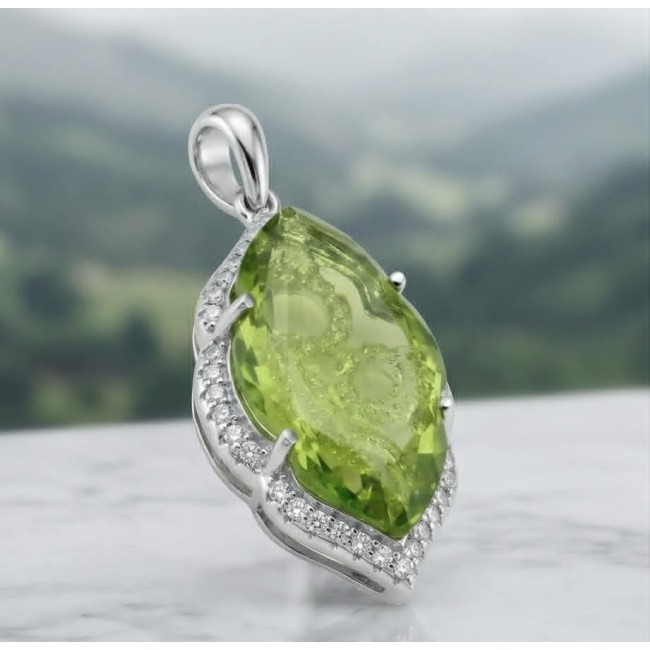 Royalty 9.9 carat authentic Himalayan Peridot .925 Sterling Silver Handcrafted Statement pendant - Close-up of Himalayan Peridot pendant in silver setting.