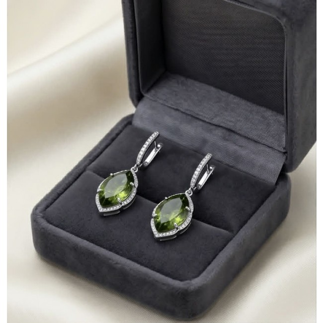 Royalty 9.9 carat authentic Himalayan Peridot .925 Sterling Silver Handcrafted Statement Earrings - Earrings with green stones in open box, top view