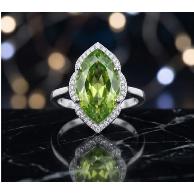 Royalty 9.9 carat authentic Himalayan Peridot .925 Sterling Silver Handcrafted Statement Ring size 7 - Close-up of marquise-cut Himalayan Peridot ring on reflective surface
