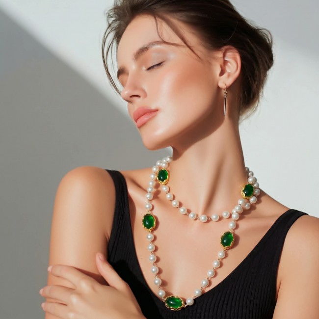 Incredible 48 inches long Freshwater Pearl 10K Gold over .925 Sterling Silver handmade Necklace - Model wearing long pearl necklace with green gemstones, side profile.