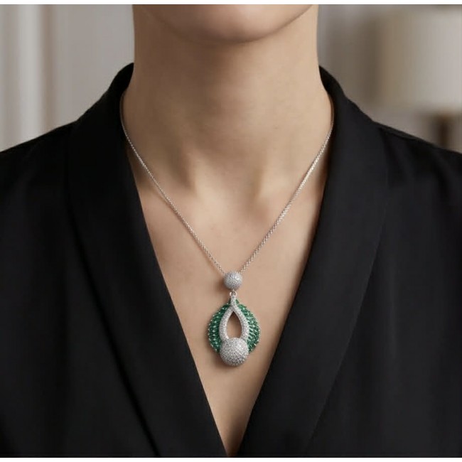 Heirloom Genuine 8.5 carat Emerald .925 Sterling Silver dipped in rhodium handmade Pendant - Necklace worn showing front view of emerald and silver pendant.