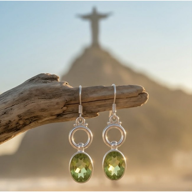 Royalty 8.9 carat authentic Brazilian Peridot .925 Sterling Silver Handcrafted Statement Earrings - Earrings on driftwood with Brazilian landmark in background