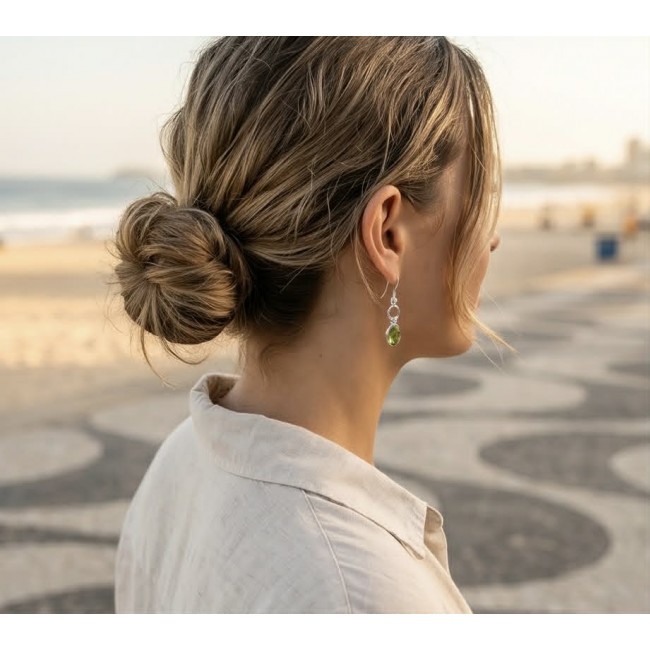 Royalty 8.9 carat authentic Brazilian Peridot .925 Sterling Silver Handcrafted Statement Earrings - Side view of woman wearing Royalty 8.9 carat Brazilian Peridot earrings.