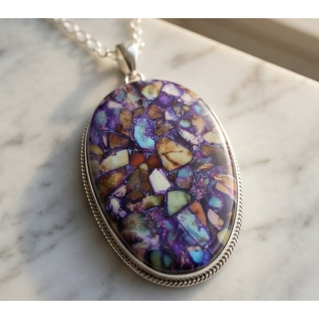 Chic Boho Style Purple Turquoise with golden Copper vains .925 Sterling Silver statement necklace - Purple turquoise pendant with copper veins, stone close-up on marble surface.