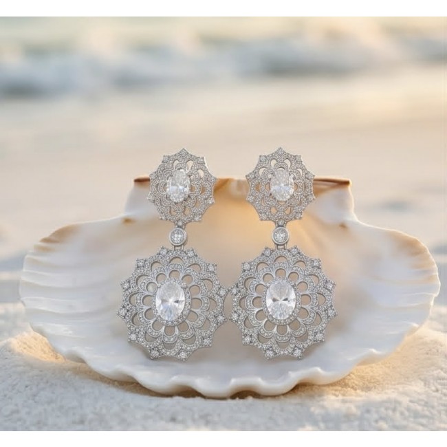 Elizabeth Natural 8.2 carat White Topaz .925 Sterling Silver handcrafted earrings - Front view of Elizabeth sterling silver earrings in a seashell display.