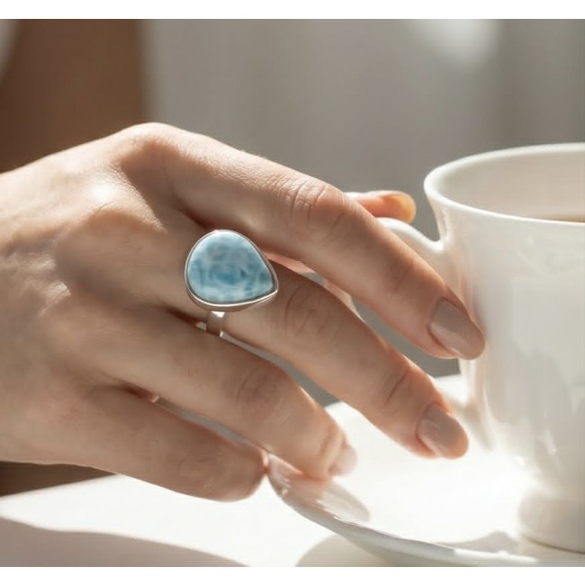 Rare and Spectacular 2259 carat authentic Andean (Peruvian) Blue Opal .925 Sterling Silver Handcrafted Ring size 8 - Blue stone ring worn on hand holding a teacup.