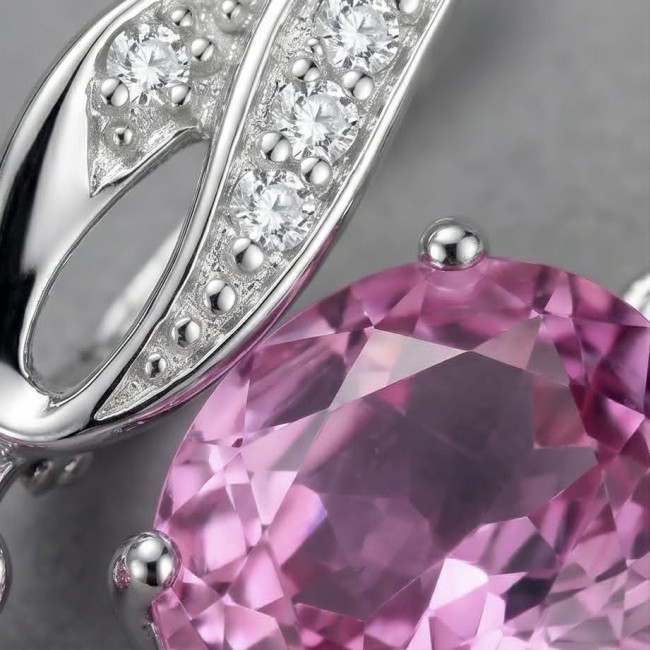 Tiffany - authentic 14.5 carat Pink Topaz .925 Sterling Silver handcrafted Earrings - Close-up of pink topaz and diamonds on a sterling silver setting.