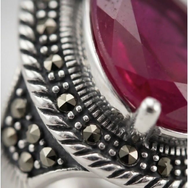 Carmen Natural 18.4 carat Ruby .925 Sterling Silver handmade Large Statement Ring size 8 - Close-up of Carmen Ruby in .925 Sterling Silver with decorative details.