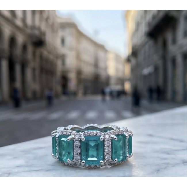 Angel's Wish 22.8 carat Aquamarine .925 Sterling Silver handcrafted infinity ring size 7 3/4 - Close-up of Angel's Wish aquamarine ring on city street background
