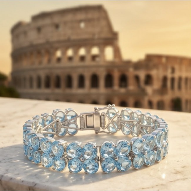 Tiffany - Magnificent 105.5 carat Swiss Blue Topaz .925 Sterling Silver handcrafted Heavy Bracelet - Blue topaz bracelet with Colosseum backdrop, showcasing stone details.